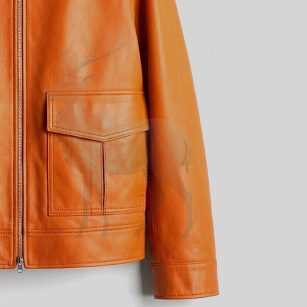 Close up sleeve cuff of men’s orange leather jacket