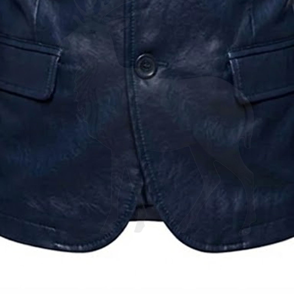 Close up front button closure detail on men’s navy blue leather blazer