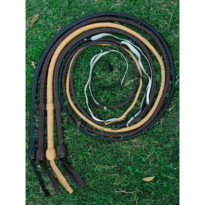 Assorted collection of handmade cowhide bullwhips in different colors