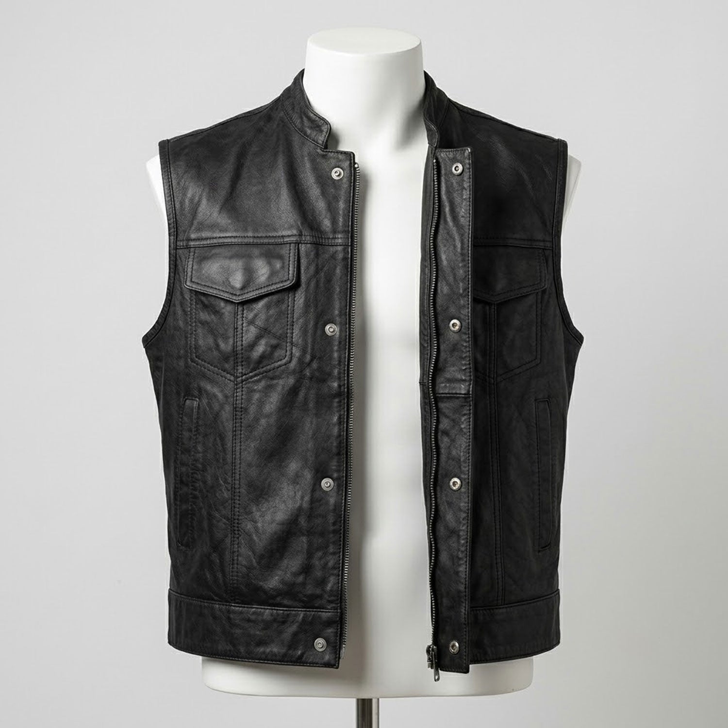 Black leather vest snap button closure detail