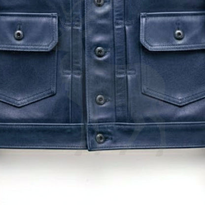 Close up lower front button detail on men’s blue genuine leather shirt jacket with classic vintage style design