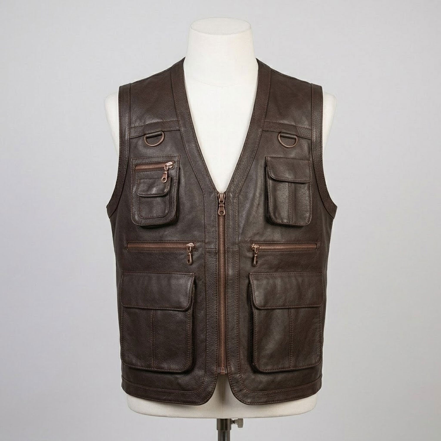 Dark brown leather vest flap pocket close-up
