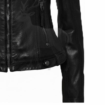 Close up sleeve detail of women’s black hooded leather jacket premium stitching smooth leather biker style finish