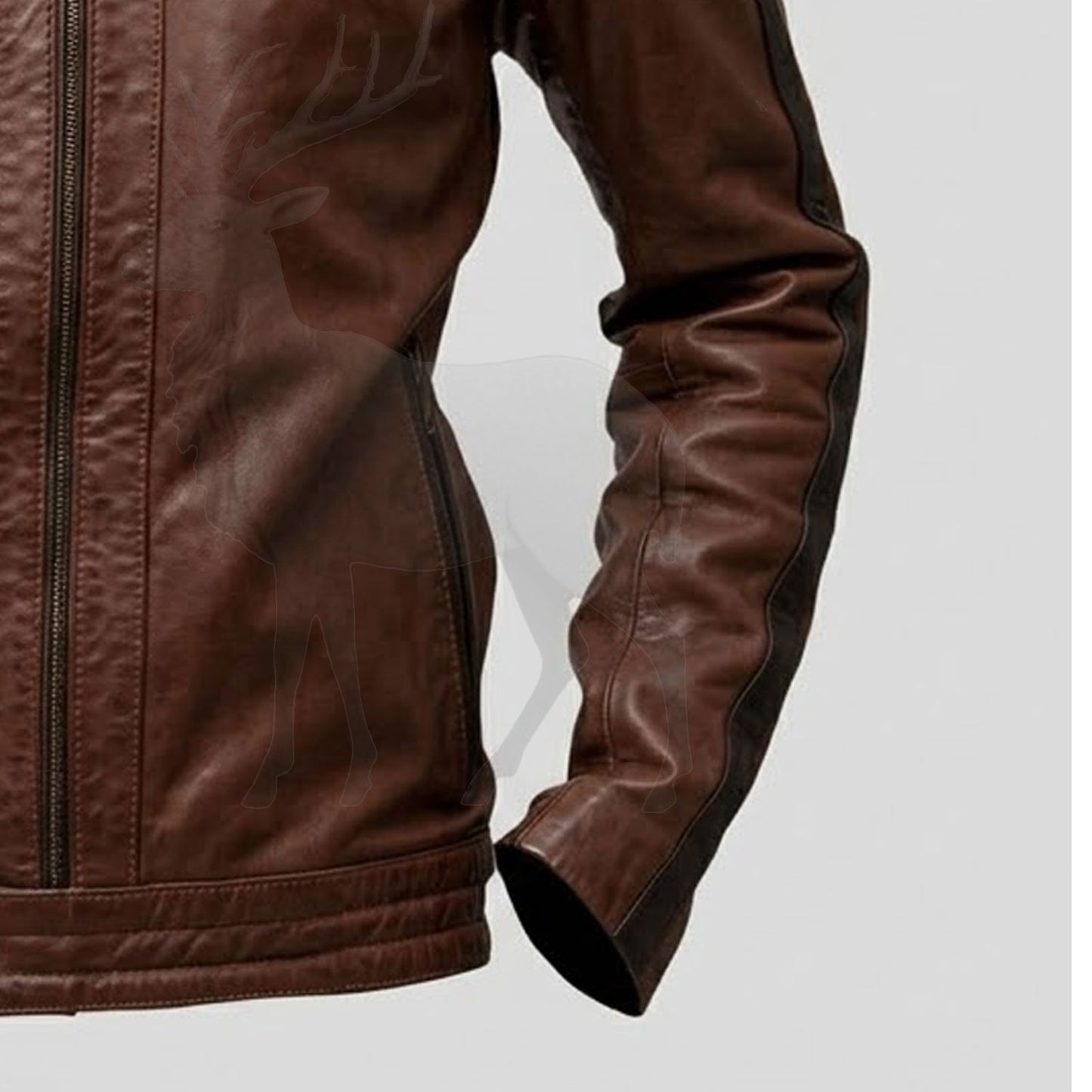 Close up sleeve detail on men’s brown leather biker jacket smooth genuine leather texture and tailored finish