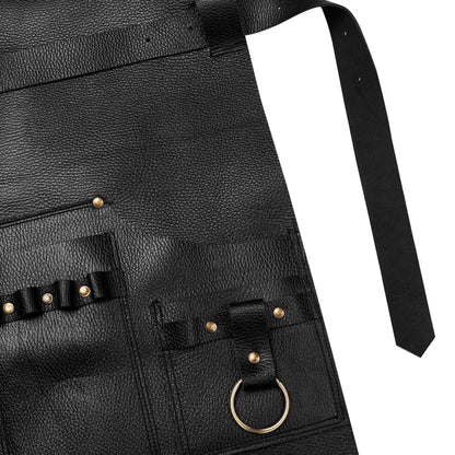 Close-up of brass towel ring and apron pockets