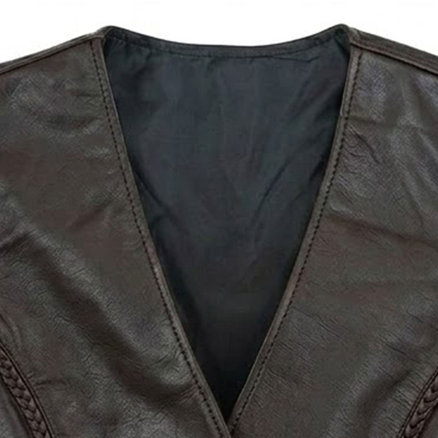 Close-up of the V-neck collar and snap button front closure on a women's dark brown leather biker vest