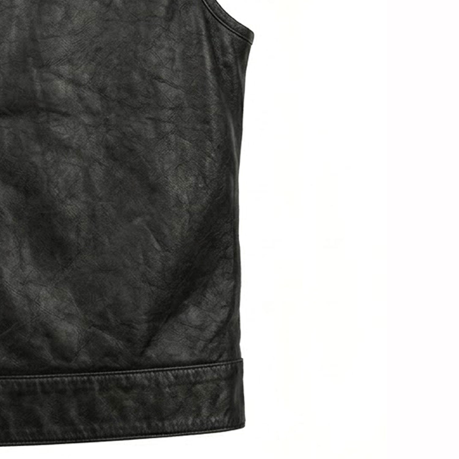 bottom hem and side construction detail of black buffalo leather vest