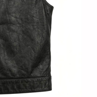 bottom hem and side construction detail of black buffalo leather vest