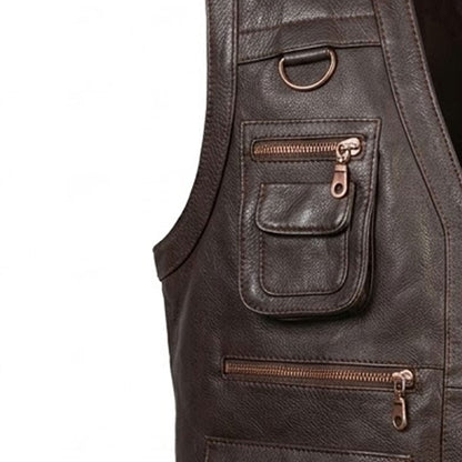 Close-up of  utility flap pocket on a men's dark brown full grain cowhide leather vest 