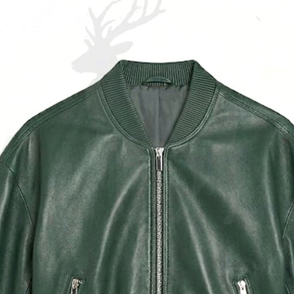 Close up ribbed bomber collar green leather jacket premium stitching detail minimalist design soft inner lining unisex jacket