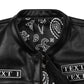 Close-up of genuine cowhide leather texture from custom embroidered biker vest, showing premium grain, durable stitching, and rugged handcrafted design. Personalized MC club vest with embroidered patches, concealed carry option, and multi-pocket layout for motorcycle riders.