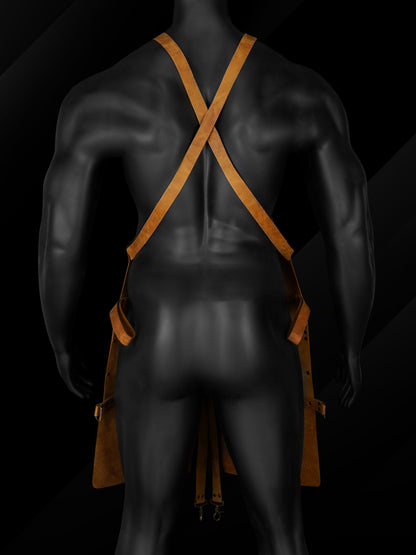 Rear view of cross-back strap design on leather work apron.