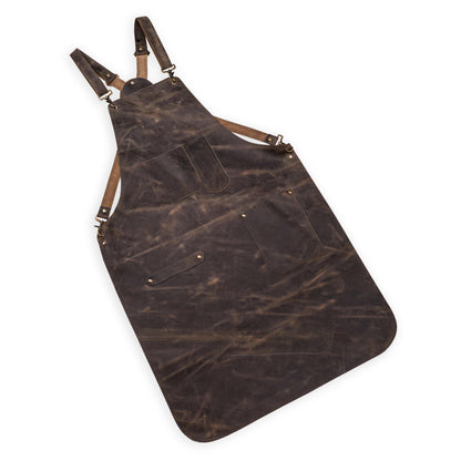Durable brass hardware and buckles on handcrafted black leather apron